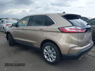 2020 Ford Edge Titanium z VIN 2FMPK3K98LBB41063, wystawiony jako IAAI lot #42204966 z przebiegiem 40 808 mil mil oraz . Historia ofert i sprzedaży dostępna na DreamBid. Obrazek 3.