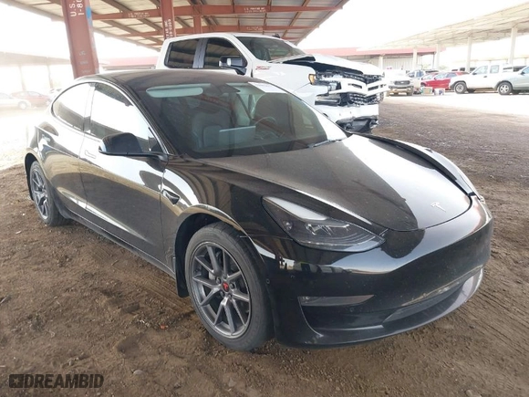 2022 Tesla Model 3 Long Range with VIN 5YJ3E1EBXNF185973, listed as a IAAI auction lot 41692577 with 131,513 mi miles. Bid and sale history available at carsss.com. Image 1.