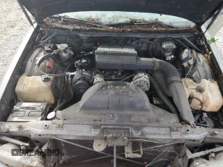 1992 Chevrolet Caprice z VIN 1G1BN53E5NW120694, wystawiony jako Copart lot #73438584 z przebiegiem 156 839 mil mil oraz Czysty tytuł • Clean title. Historia ofert i sprzedaży dostępna na DreamBid. Obrazek 11.