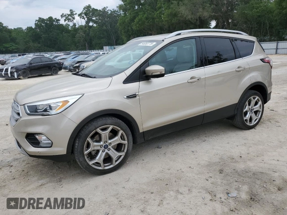 2017 Ford Escape Titanium with VIN 1FMCU0J95HUB96659, listed as a Copart auction lot 54053775 with 69,744 mi miles and Salvage Title. Bid and sale history available at DreamBid. Image 1.
