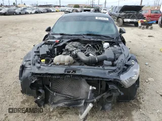 2017 Ford Mustang V6 with VIN 1FA6P8AM6H5287032, listed as a Copart auction lot 50973275 with 98,477 mi miles and Salvage Title. Bid and sale history available at carsss.com. Image 5.