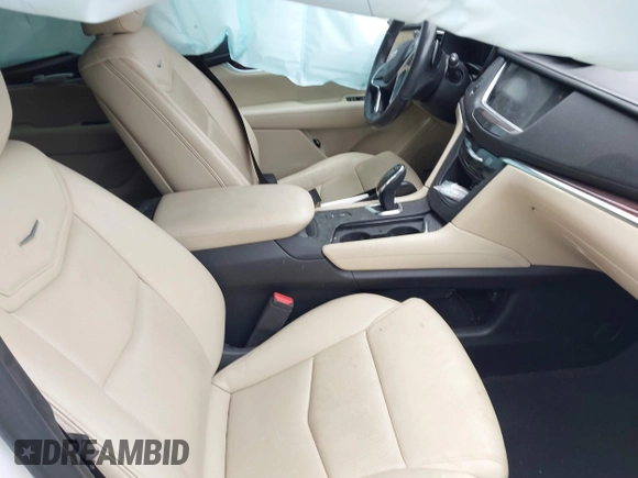 2019 Cadillac XT5 Premium Luxury FWD z VIN 1GYKNERS1KZ290754, wystawiony jako IAAI lot #41816074 z przebiegiem 91 585 mil mil oraz . Historia ofert i sprzedaży dostępna na DreamBid. Obrazek 5.