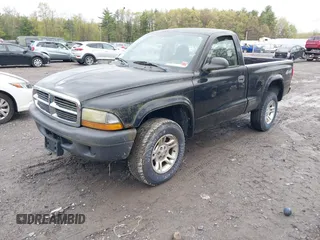 2004 Dodge Dakota with VIN 1D7GG16K44S588932, listed as a IAAI auction lot 42205360 with 77,465 mi miles and . Bid and sale history available at carsss.com. Image 2.