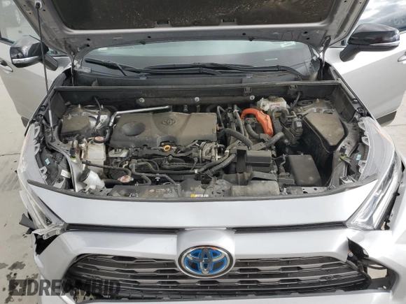 2021 Toyota RAV4 Hybrid XSE with VIN 4T3E6RFV2MU016441, listed as a Copart auction lot 57090975 with 69,304 mi miles and Salvage title. Bid and sale history available at DreamBid. Image 12.