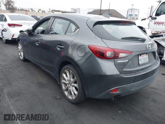 2014 Mazda 3 S Touring with VIN JM1BM1L35E1208952, listed as a IAAI auction lot 42121077 with 183,985 mi miles and . Bid and sale history available at carsss.com. Image 3.