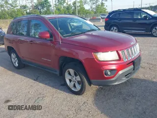 2016 Jeep Compass High Altitude Edition with VIN 1C4NJCEA9GD599487, listed as a IAAI auction lot 42087686 with 176,820 mi miles. Bid and sale history available at carsss.com. Image 1.