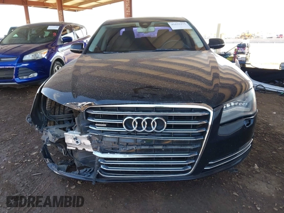 2011 Audi A8 with VIN WAURVAFD1BN027915, listed as a IAAI auction lot 41635275 with 95,143 mi miles and . Bid and sale history available at DreamBid. Image 13.
