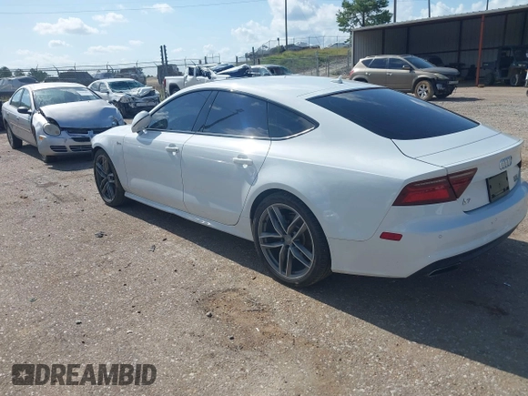 2016 Audi A7 Premium Plus with VIN WAUWGAFC2GN021696, listed as a IAAI auction lot 42595234 with 112,464 mi miles and . Bid and sale history available at DreamBid. Image 3.