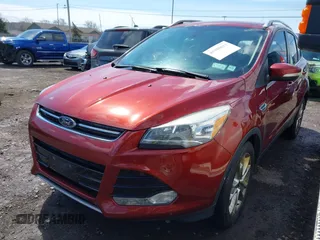 2015 Ford Escape Titanium with VIN 1FMCU0JX8FUA89049, listed as a IAAI auction lot 41988611 with 277,003 mi miles. Bid and sale history available at carsss.com. Image 2.