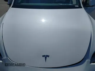 2021 Tesla Model Y Long Range with VIN 5YJYGDEEXMF280480, listed as a IAAI auction lot 41993633 with 69,579 mi miles. Bid and sale history available at carsss.com. Image 10.