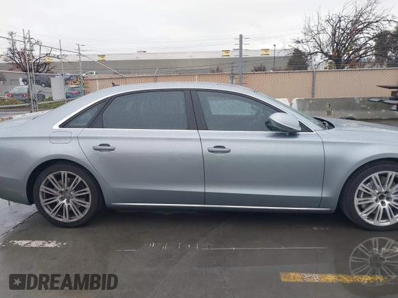 2012 Audi A8 z VIN WAURVAFD5CN008320, wystawiony jako IAAI lot #41508237 z przebiegiem 183 398 mil mil oraz . Historia ofert i sprzedaży dostępna na DreamBid. Obrazek 13.
