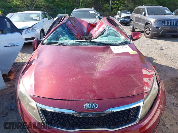 2013 Kia Optima LX z VIN 5XXGM4A76DG152178, wystawiony jako IAAI lot #42002201 z przebiegiem 72 335 mil mil oraz . Historia ofert i sprzedaży dostępna na DreamBid. Obrazek 6.