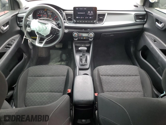 2023 Kia Rio S with VIN 3KPA24AD1PE552714, listed as a Copart auction lot 49243375 with 50,657 mi miles and Salvage Title. Bid and sale history available at carsss.com. Image 8.