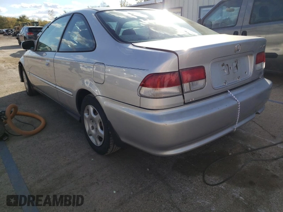 2000 Honda Civic EX with VIN 1HGEJ8244YL034570, listed as a Copart auction lot 73169083 with 88,266 mi miles and Salvage title. Bid and sale history available at DreamBid. Image 2.