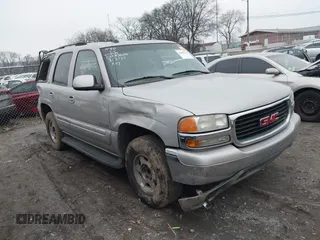 2004 GMC Yukon SLT with VIN 1GKEC13V84J307995, listed as a IAAI auction lot 41499124 with 305,264 mi miles. Bid and sale history available at carsss.com. Image 1.