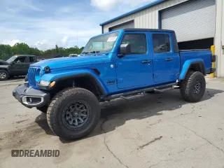 2021 Jeep Gladiator Freedom с VIN 1C6HJTAG7ML553303, выставлен на аукционе Copart как лот 57038585 с пробегом 49 400 миль миль и Списание • Salvage title. История ставок и продаж доступна на DreamBid. Изображение 1.