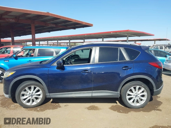 2014 Mazda CX-5 Grand Touring with VIN JM3KE2DY2E0349343, listed as a IAAI auction lot 41725214 with 271,094 mi miles. Bid and sale history available at carsss.com. Image 14.