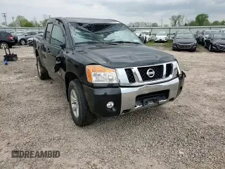 2012 Nissan Titan SV z VIN 1N6AA0EC0CN311288, wystawiony jako Copart lot #56845405 z przebiegiem 71 180 mil mil oraz Szkoda całkowita • Salvage title. Historia ofert i sprzedaży dostępna na DreamBid. Obrazek 14.