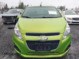 2015 Chevrolet Spark LS with VIN KL8CB6S98FC728462, listed as a IAAI auction lot 41653899 with 105,432 mi miles and . Bid and sale history available at DreamBid. Image 12.