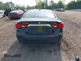 2016 Nissan Maxima Platinum z VIN 1N4AA6AP8GC901079, wystawiony jako IAAI lot #42423396 z przebiegiem 100 750 mil mil oraz . Historia ofert i sprzedaży dostępna na DreamBid. Obrazek 16.
