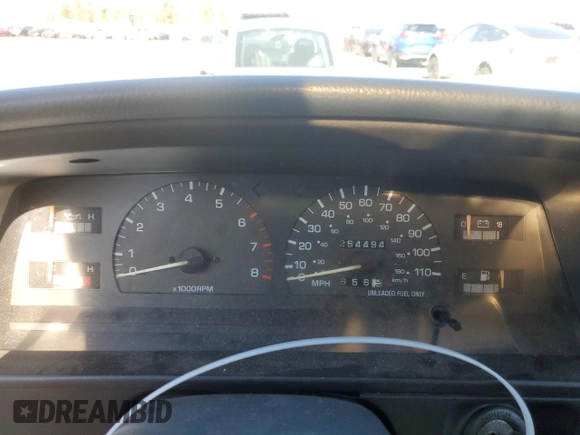 1993 Toyota Pickup SR5 z VIN JT4VN13G0P5124241, wystawiony jako Copart lot #44253055 z przebiegiem 254 494 mil mil oraz Szkoda całkowita • Salvage title. Historia ofert i sprzedaży dostępna na DreamBid. Obrazek 9.