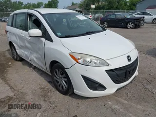 2012 Mazda 5 Sport с VIN JM1CW2BL0C0130461, выставлен на аукционе IAAI как лот 42693228 с пробегом 168 072 миль миль и . История ставок и продаж доступна на DreamBid. Изображение 1.