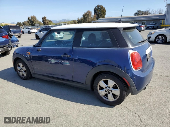 2014 MINI Hardtop with VIN WMWXM5C52ET932677, listed as a Copart auction lot 53486865 with 189,039 mi miles and Salvage title. Bid and sale history available at DreamBid. Image 2.