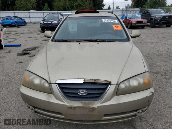 2005 Hyundai Elantra GLS z VIN KMHDN46D05U169323, wystawiony jako Copart lot #55138445 z przebiegiem 142 454 mil mil oraz Czysty tytuł • Clean title. Historia ofert i sprzedaży dostępna na DreamBid. Obrazek 5.