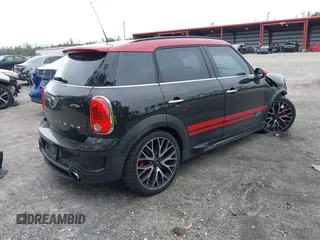 2014 MINI Countryman John Cooper Works with VIN WMWXD1C52EWS34531, listed as a IAAI auction lot 41617056 with 138,544 mi miles and . Bid and sale history available at DreamBid. Image 4.