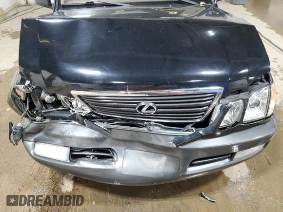 2002 Lexus LX 470 z VIN JTJHT00W023515545, wystawiony jako Copart lot #79218054 z przebiegiem 310 334 mil mil oraz Szkoda całkowita • Salvage title. Historia ofert i sprzedaży dostępna na DreamBid. Obrazek 14.