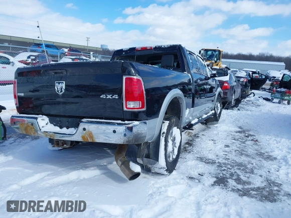 2015 Ram 2500 Laramie with VIN 3C6UR5FLXFG584408, listed as a IAAI auction lot 41588107 with 177,520 mi miles. Bid and sale history available at carsss.com. Image 4.