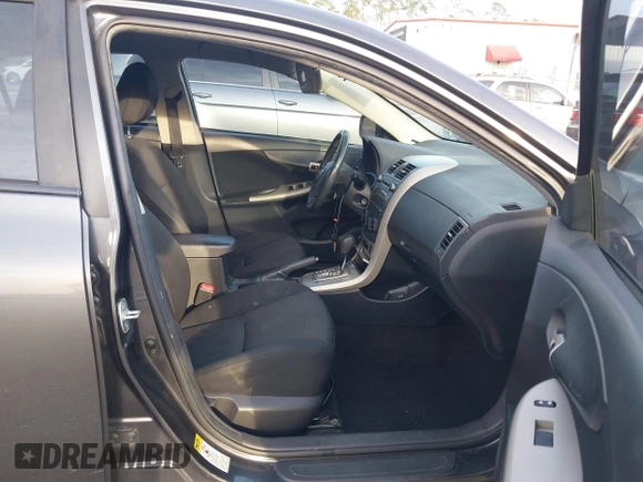 2010 Toyota Corolla with VIN 2T1BU4EEXAC416895, listed as a IAAI auction lot 41697477 with 135,325 mi miles and . Bid and sale history available at DreamBid. Image 5.