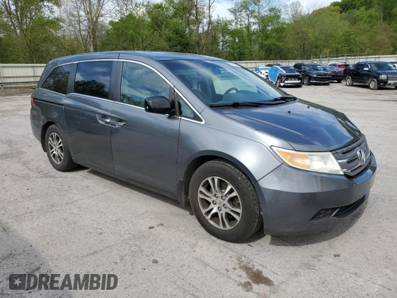2011 Honda Odyssey EX-L with VIN 5FNRL5H6XBB002136, listed as a Copart auction lot 55162645 with 172,425 mi miles and Salvage Title. Bid and sale history available at DreamBid. Image 4.
