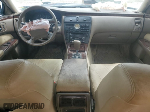 1999 Infiniti Q45 z VIN JNKBY31A6XM600579, wystawiony jako Copart lot #57683075 z przebiegiem 215 415 mil mil oraz Szkoda całkowita • Salvage title. Historia ofert i sprzedaży dostępna na DreamBid. Obrazek 8.
