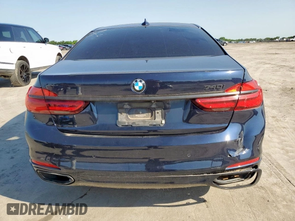 2016 BMW 7 Series 740i с VIN WBA7E2C55GG504304, выставлен на аукционе Copart как лот 59251345 с пробегом 115 942 миль миль и Чистый • Clean title. История ставок и продаж доступна на DreamBid. Изображение 6.