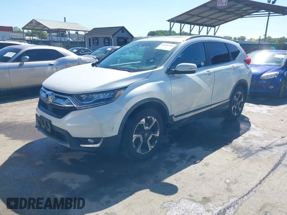 2019 Honda CR-V Touring с VIN JHLRW2H98KX003911, выставлен на аукционе IAAI как лот 42306400 с пробегом 105 780 миль миль и . История ставок и продаж доступна на DreamBid. Изображение 18.