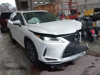 2020 Lexus RX with VIN JTJHZKEA4L2016195, listed as a IAAI auction lot 41708998 with 56,537 mi miles. Bid and sale history available at carsss.com. Image 1.