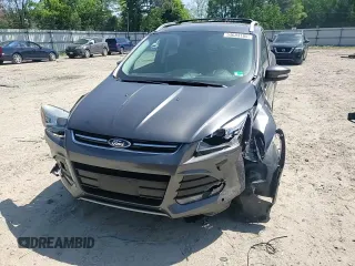 2015 Ford Escape Titanium with VIN 1FMCU9J92FUC74879, listed as a Copart auction lot 54683185 with 143,436 mi miles and Salvage title. Bid and sale history available at DreamBid. Image 14.
