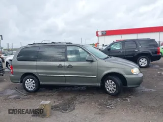 2005 Kia Sedona LX with VIN KNDUP132656734193, listed as a IAAI auction lot 41892342 with 91,768 mi miles. Bid and sale history available at carsss.com. Image 13.