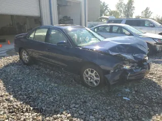 2000 Oldsmobile Intrigue GL z VIN 1G3WS52H3YF116774, wystawiony jako Copart lot #70325574 z przebiegiem 108 912 mil mil oraz Czysty tytuł • Clean title. Historia ofert i sprzedaży dostępna na DreamBid. Obrazek 4.