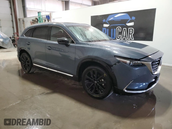 2023 Mazda CX-9 Grand Touring with VIN JM3TCBDY0P0640629, listed as a Copart auction lot 49310145 with 52,425 mi miles and Clean Title. Bid and sale history available at DreamBid. Image 4.