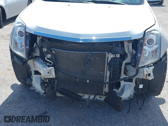 2016 Cadillac SRX Luxury Collection with VIN 3GYFNBE33GS551059, listed as a IAAI auction lot 39684221 with 78,321 mi miles and . Bid and sale history available at DreamBid. Image 6.