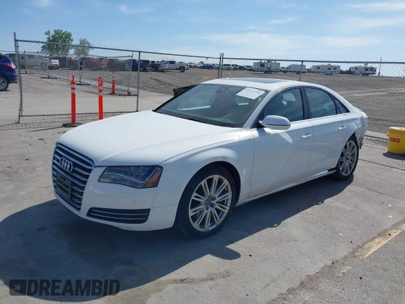 2011 Audi A8 z VIN WAUAVAFD7BN021601, wystawiony jako IAAI lot #42233726 z przebiegiem 182 583 mil mil oraz . Historia ofert i sprzedaży dostępna na DreamBid. Obrazek 2.