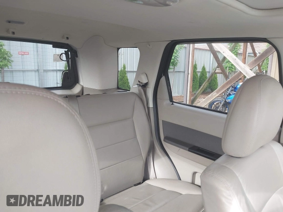2009 Ford Escape Hybrid with VIN 1FMCU593X9KB70360, listed as a IAAI auction lot 42270239 with 133,658 mi miles and . Bid and sale history available at DreamBid. Image 8.