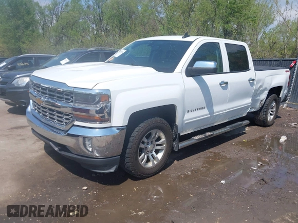 2016 Chevrolet Silverado 1500 LT with VIN 1GCUKREC1GF121209, listed as a IAAI auction lot 42024911 with 152,671 mi miles and . Bid and sale history available at DreamBid. Image 18.
