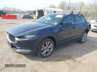 2021 Mazda CX-30 Premium with VIN 3MVDMBDM4MM238367, listed as a IAAI auction lot 42124335 with 31,120 mi miles and . Bid and sale history available at DreamBid. Image 17.