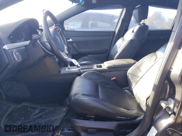 2009 Pontiac G8 with VIN 6G2ER57749L235662, listed as a Copart auction lot 73972344 with 146,384 mi miles and Salvage Title. Bid and sale history available at DreamBid. Image 7.