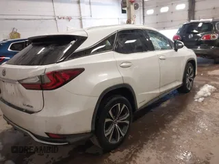 2021 Lexus RX with VIN 2T2HGMDA6MC064446, listed as a IAAI auction lot 41108859 with 116,930 mi miles. Bid and sale history available at carsss.com. Image 4.