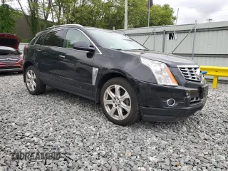 2014 Cadillac SRX Performance Collection with VIN 3GYFNFE33ES687941, listed as a Copart auction lot 57726675 with 164,059 mi miles and Clean title. Bid and sale history available at DreamBid. Image 4.