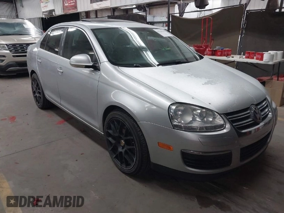 2009 Volkswagen Jetta Sedan SE with VIN 3VWRM71K09M033754, listed as a IAAI auction lot 41949678 with 198,344 mi miles. Bid and sale history available at carsss.com. Image 1.